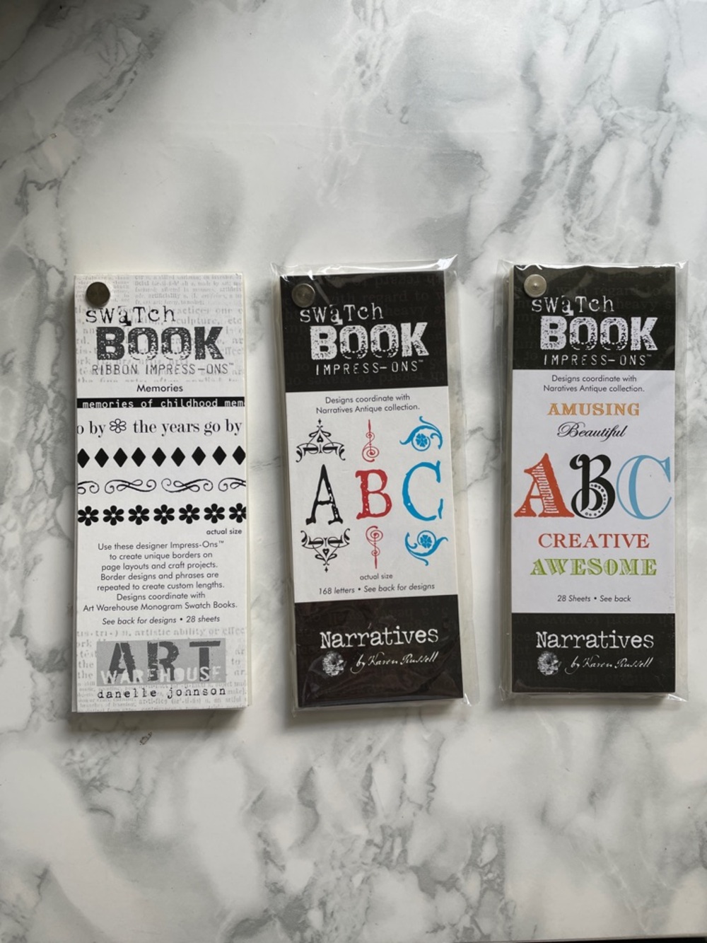 CREATIVE IMAGINATIONS ASSORTED SWATCH BOOK IMPRESS-ONS